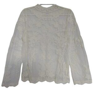 Vintage-Inspired White Lace Blouse With Long Sleeves & Button-Back Closure.